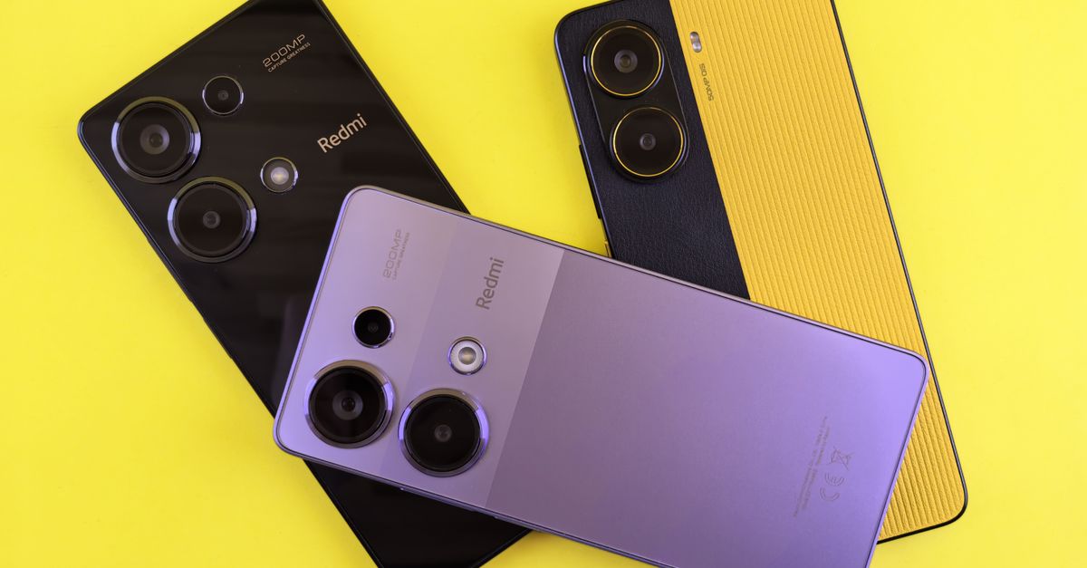 Three modern smartphones arranged creatively on a vivid yellow backdrop, showcasing sleek design and colors.